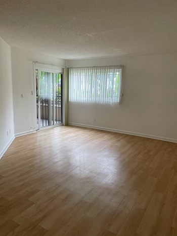 Living Room with Hardwood Floors and Patio Doors