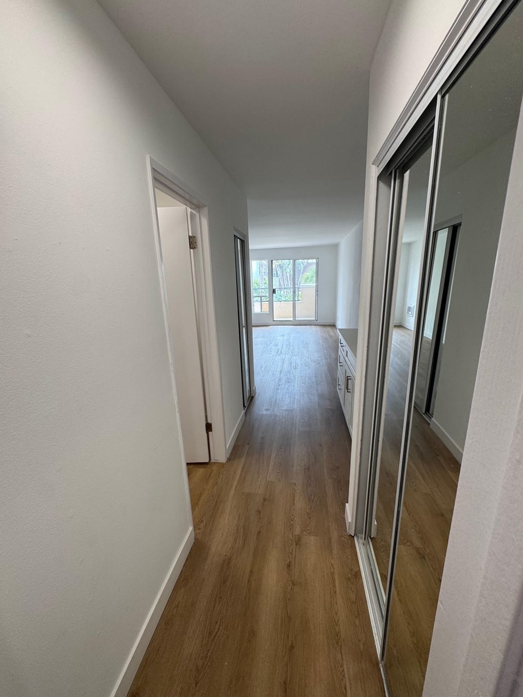 Bedroom with wood flooring
