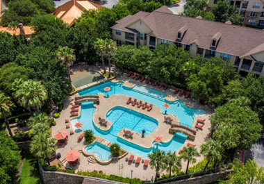 an aerial view of the resort style pool and lazy river