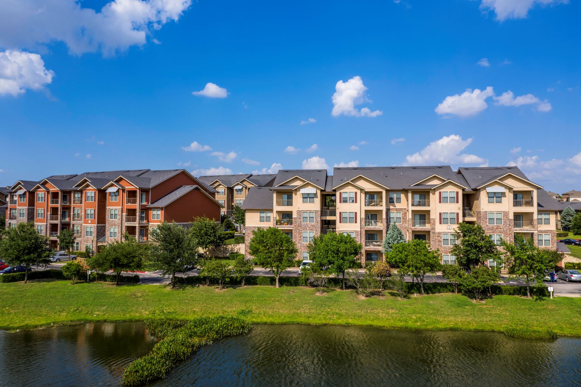 Lake With Exterior at Las Brisas Apartment Homes, Round Rock, 78665