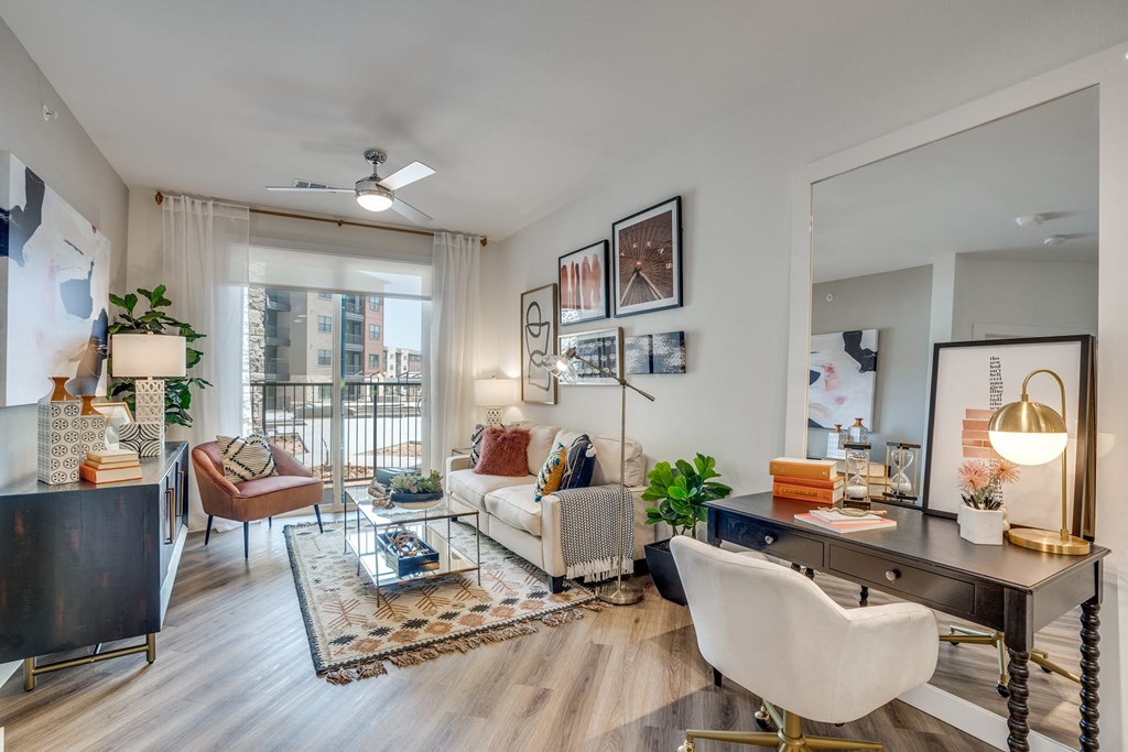 a spacious living room with white walls and hardwood flooring at Aurora Watson Branch, Mansfield