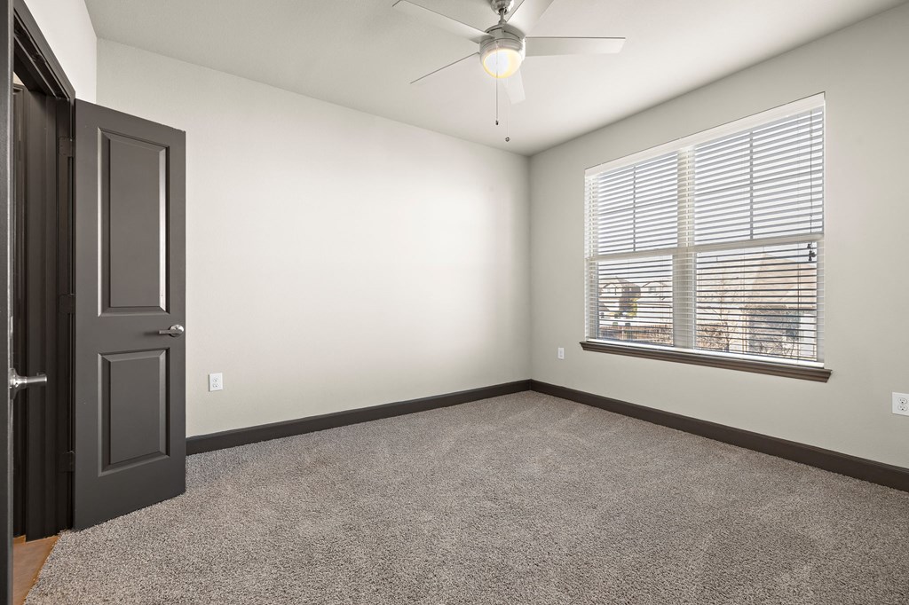 Carpeted Bedroom at North Creek, Hutto, Texas