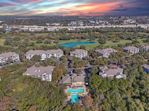 Aerial view of apartment community and golf course at Legends on the Green Apartments, Texas, 78232
