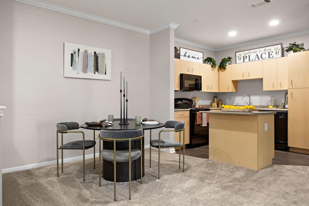 a kitchen and dining area at Artisan Apartments & Shops, Austin, Texas