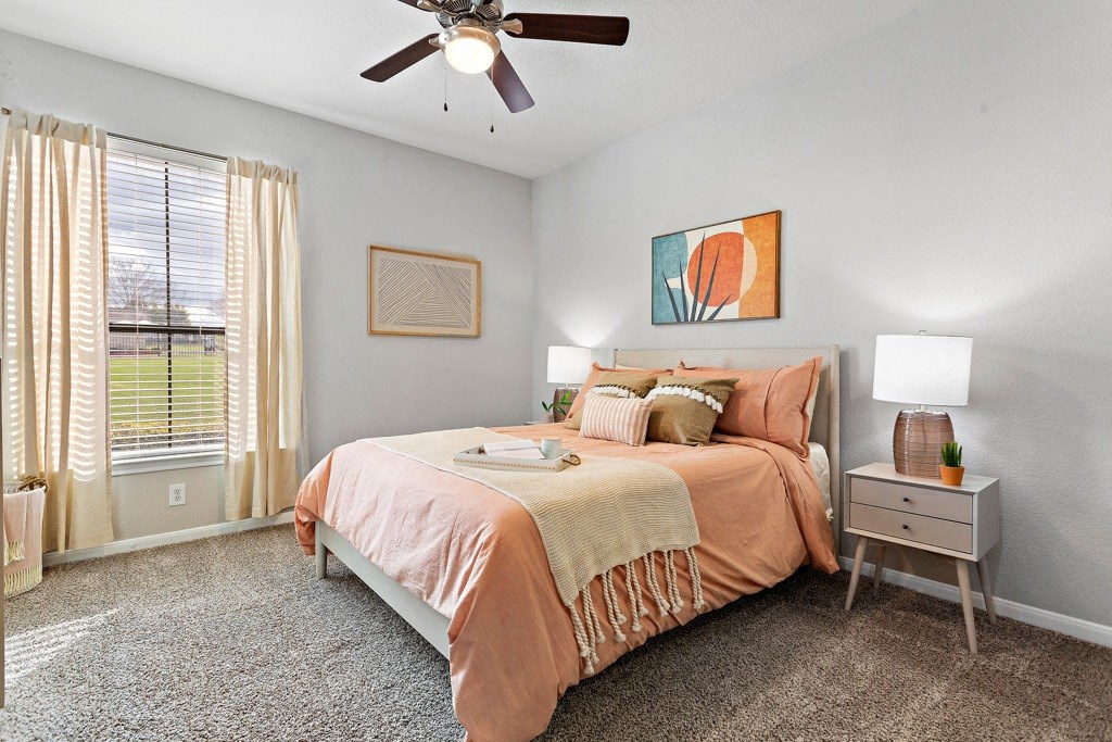 Large bedrooms with lots of natural light! at The Fairways at Star Ranch, Texas