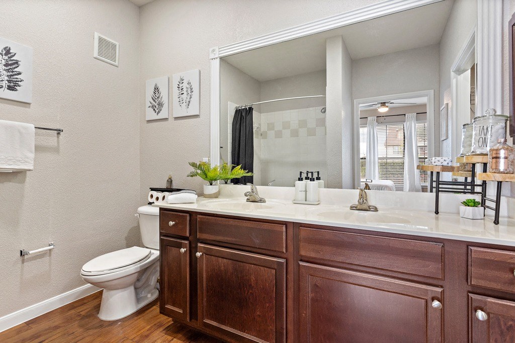 Double vanities and lots of light! at The Fairways at Star Ranch, Hutto