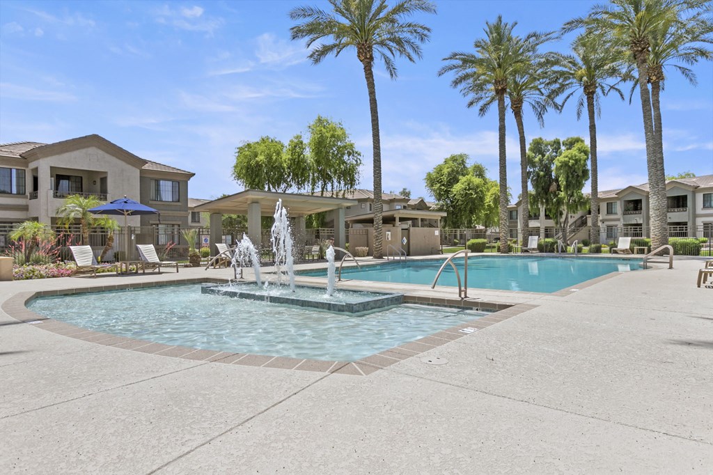 take a dip in the resort style pool at the whispering winds apartments in pearland, tx  at Adiamo Palm Valley, Goodyear, AZ, 85395