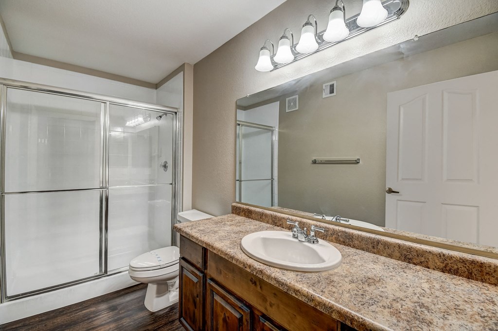 a bathroom with a sink and a shower and a toilet  at San Montego Apartments, Arizona, 85206