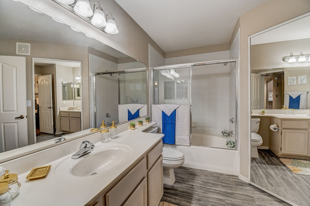 a bathroom with a sink and a shower and a toilet  at San Montego Apartments, Arizona