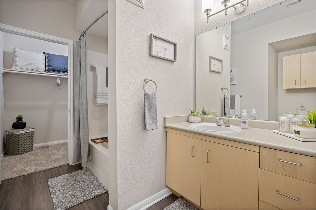 a bathroom with a shower and a sink at Artisan Apartments & Shops, Austin, TX 78729