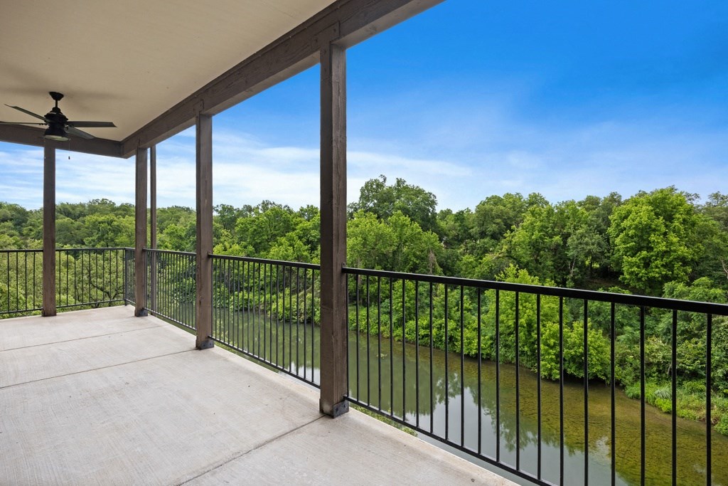 a balcony with a view of a body of water at Waters Edge Apartment Homes, Georgetown