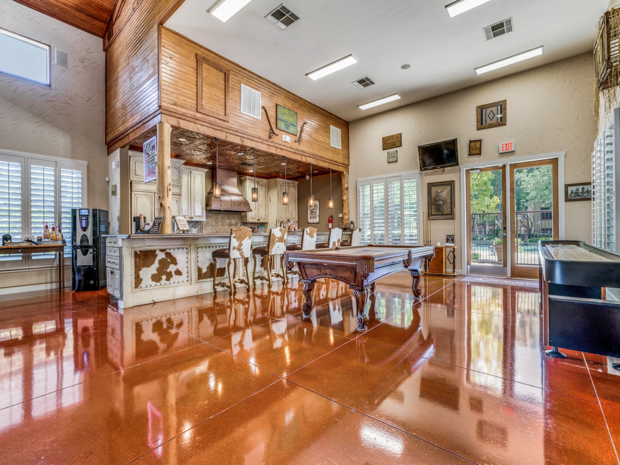 Community kitchen and lounge in resident clubhouse at The Canyons Apartments, Fort Worth, TX, 76116