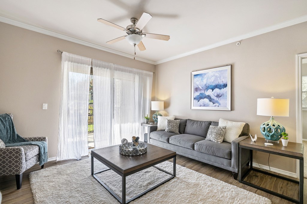a living room with a couch and a coffee table at Sonterra Apartment Homes, Austin, 78726