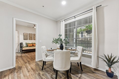 Dining area with elegant table and seating at Stone Oak @ Parmer Apartments, Texas, 78727