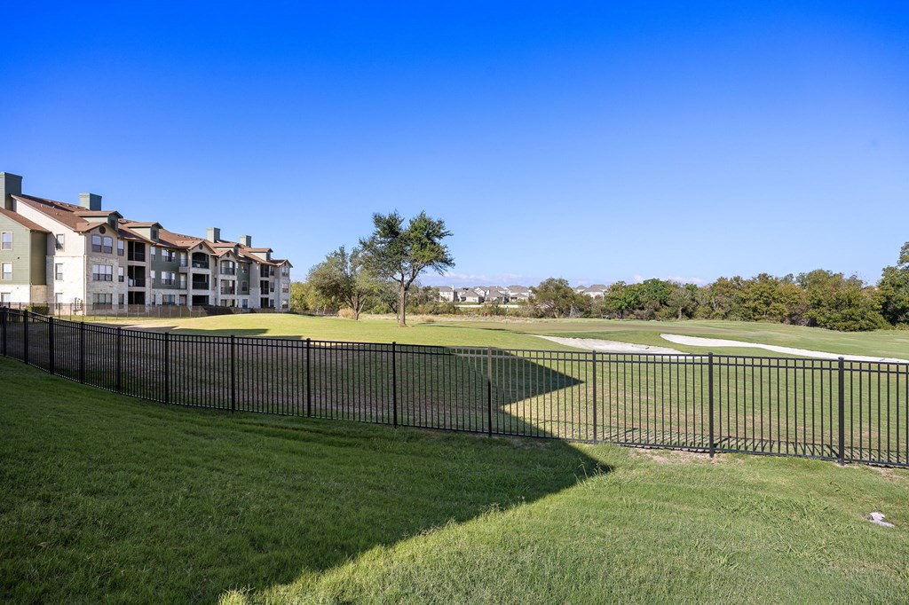a view of the golf course at the preserve at polk apartments at The Fairways at Star Ranch, Hutto, Texas