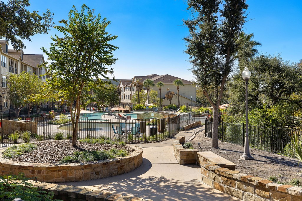 the preserve at ballantyne commons community courtyard with pool and trees at The Verandah, Austin, 78726
