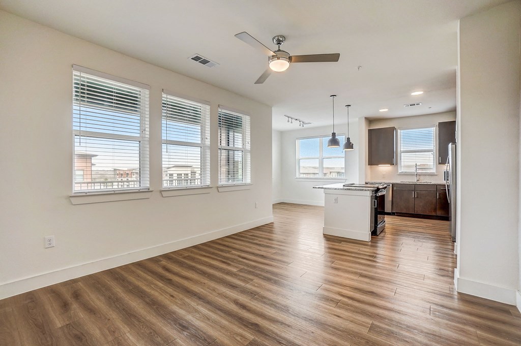 a view of a hallway with a display ofurses on the wall and a floor at Aurora Watson Branch, Texas