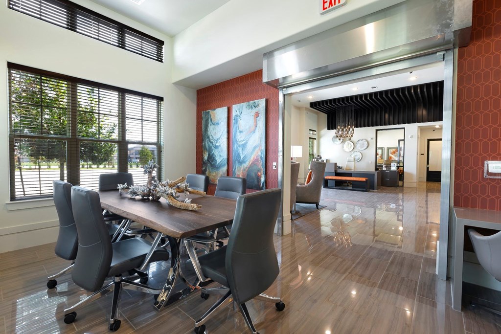 a dining room with a wooden table and chairs at North Creek, Texas, 78634