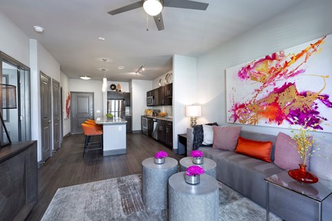 a living room with a couch and a table