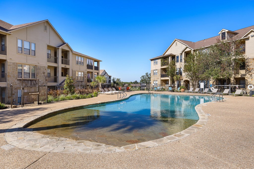 the swimming pool at the preserve at polo ridge apartments at The Verandah, Austin, TX, 78726
