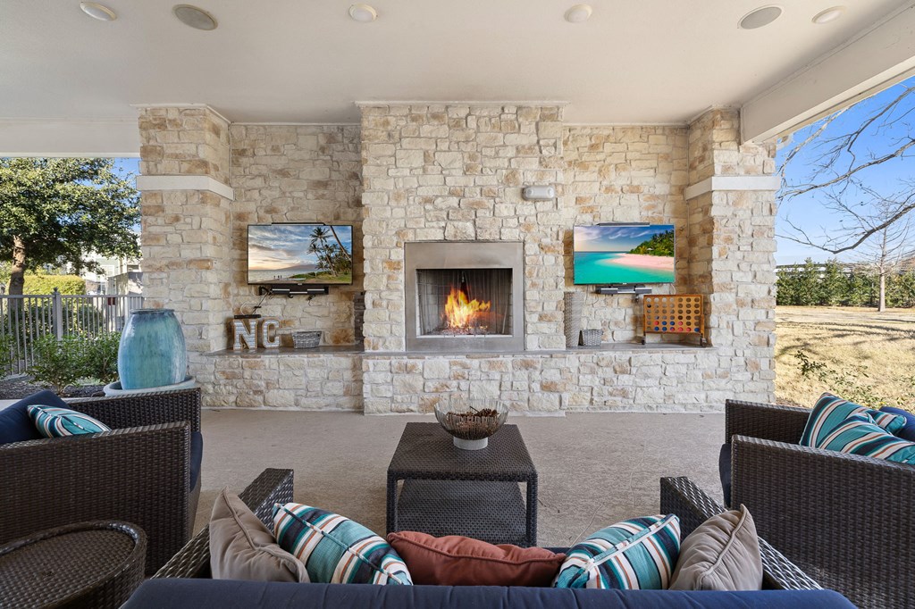 Living Area With Fireplace at North Creek, Hutto, 78634