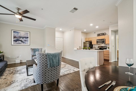 Dining area with open floor plan and kitchen at TalaVera Apartments, Texas, 78232