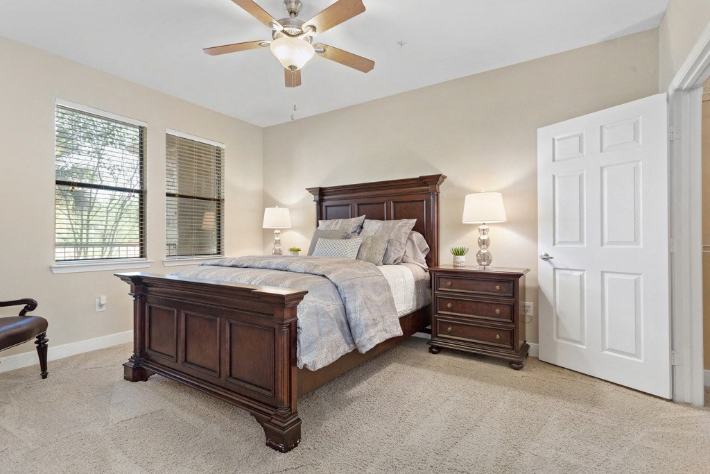 a bedroom with a bed and two night stands at The Verandah, Texas, 78726