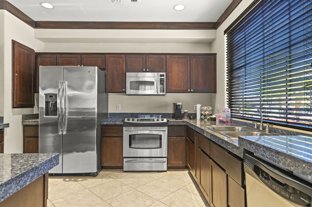 A large kitchen clubhouse ready for gatherings  at Adiamo Palm Valley, Arizona, 85395