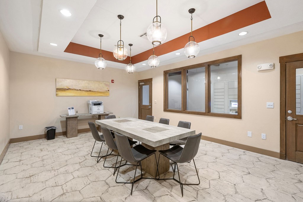 a dining room with a table and chairs at Lakeline East Apartments, Texas, 78613