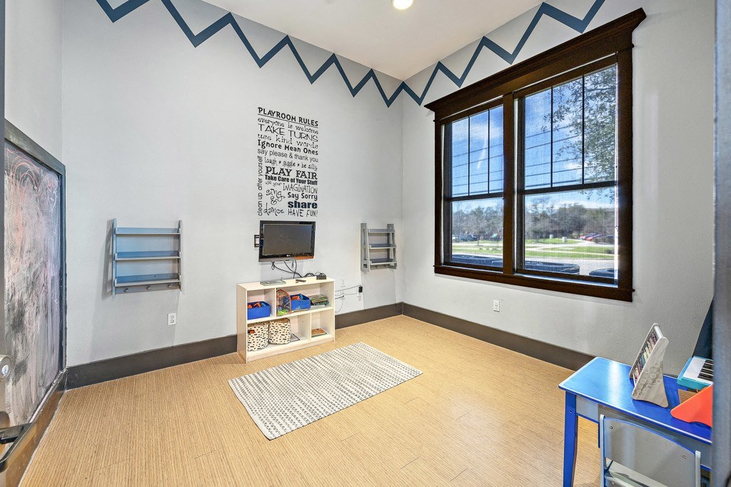 Living Area With TV at Las Brisas Apartment Homes, Round Rock, Texas