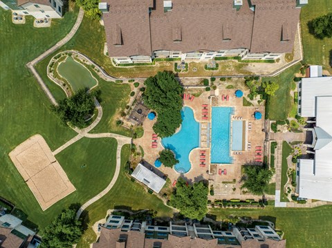 Aerial view of resort style pool and recreation area at The Fairways at Star Ranch Apartments, Hutto, TX 78634