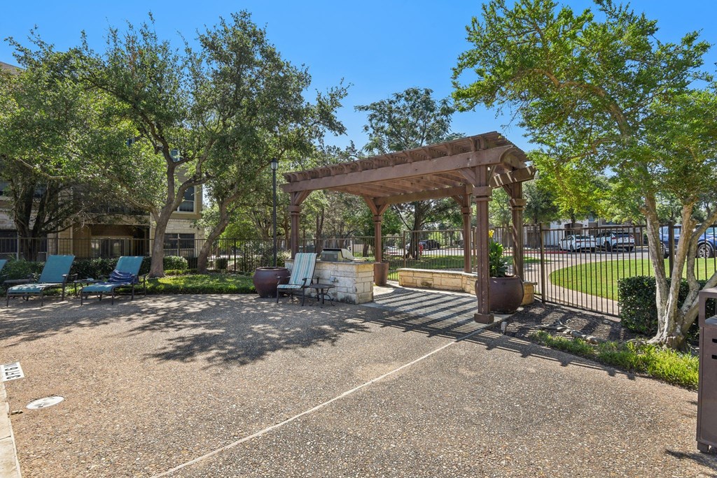 a park with a gazebo and benches at Sonterra Apartment Homes, Austin, 78726