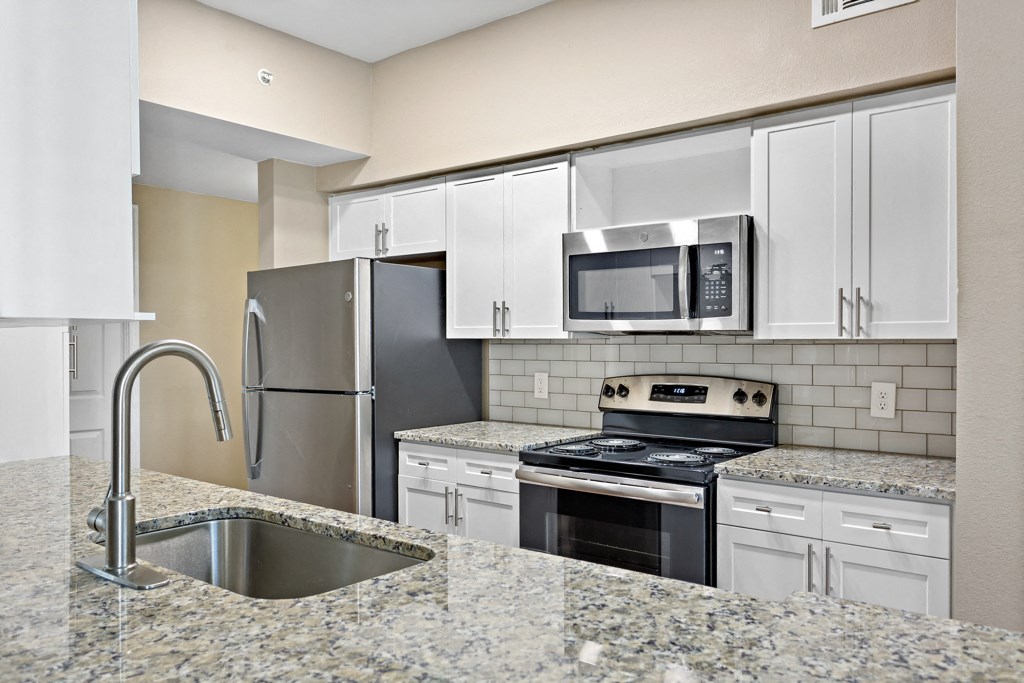 Modern Kitchen With Custom Cabinet  at Stone Oak @ Parmer, Austin, TX