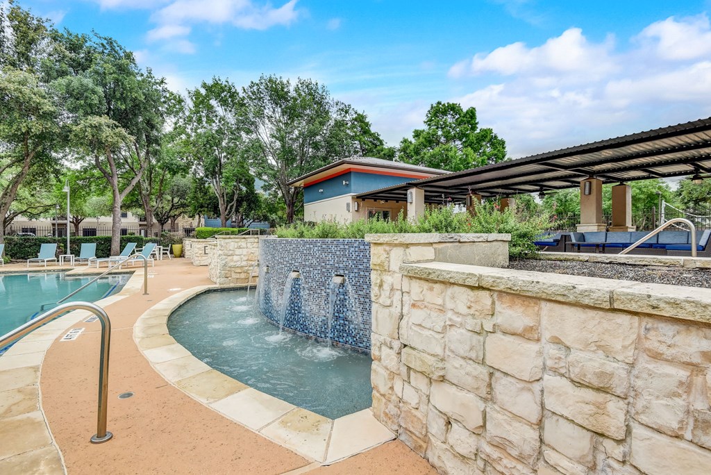 pool and spa with water fountain at Artisan Apartments & Shops, Austin, TX