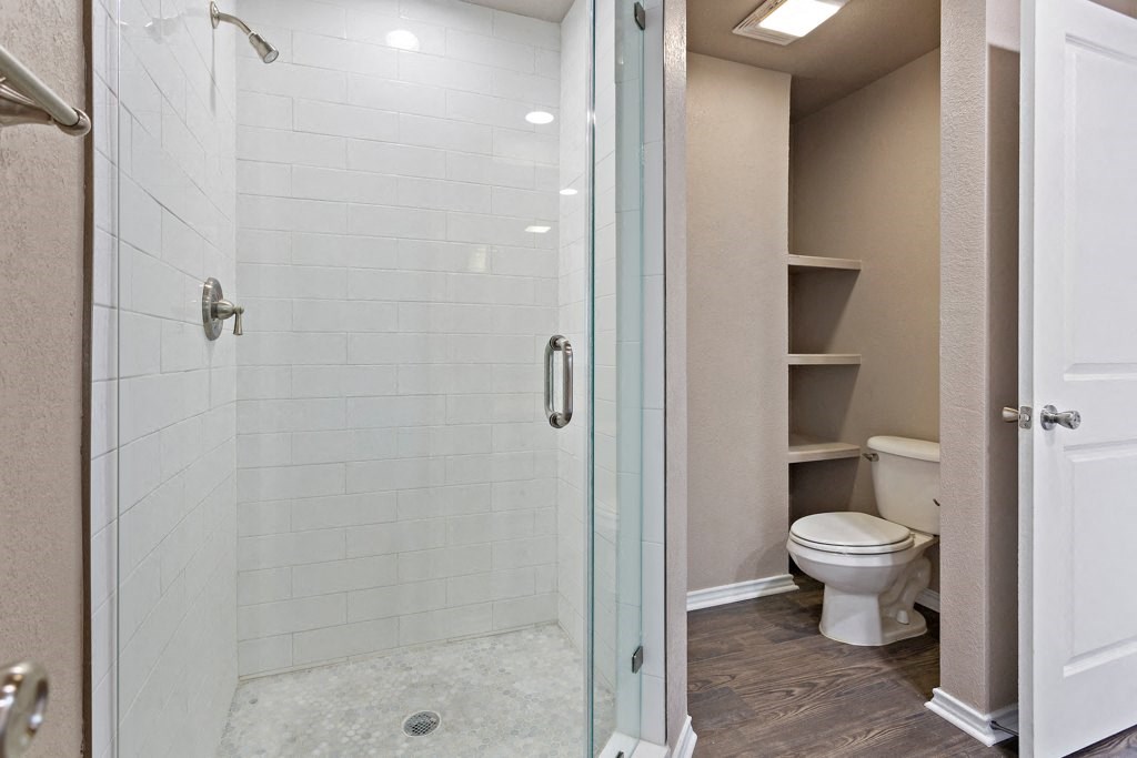 Frameless Showers (In Some Homes) at Waters Edge Apartment Homes, Georgetown, Texas