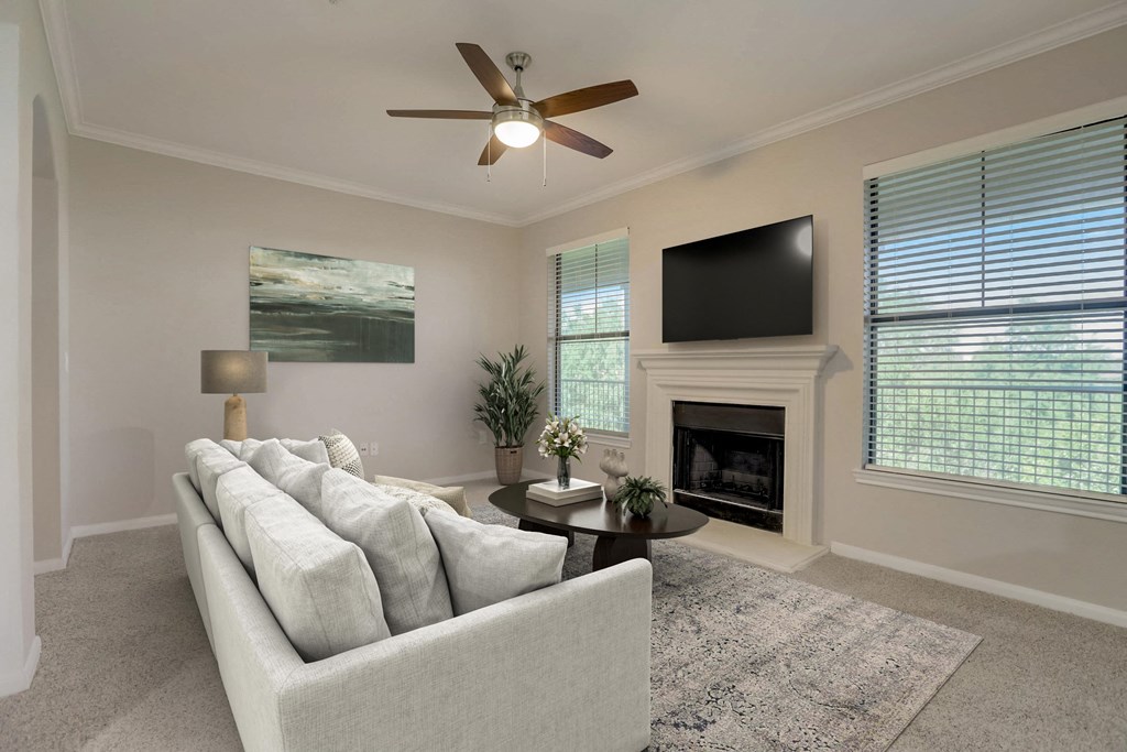 a living room with a couch and a tv