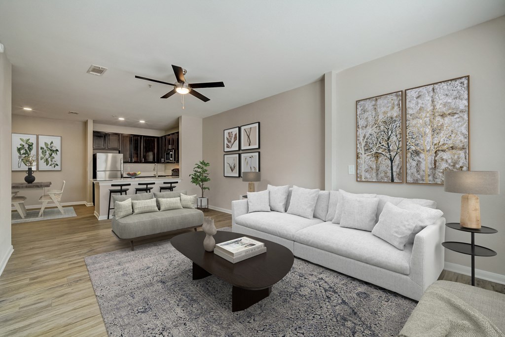 a living room with couches and a coffee table