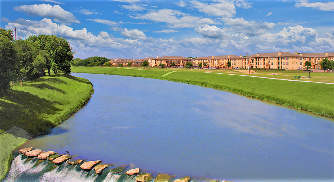View of the Community from the Trinity River at The Canyons Apartments, Fort Worth, TX