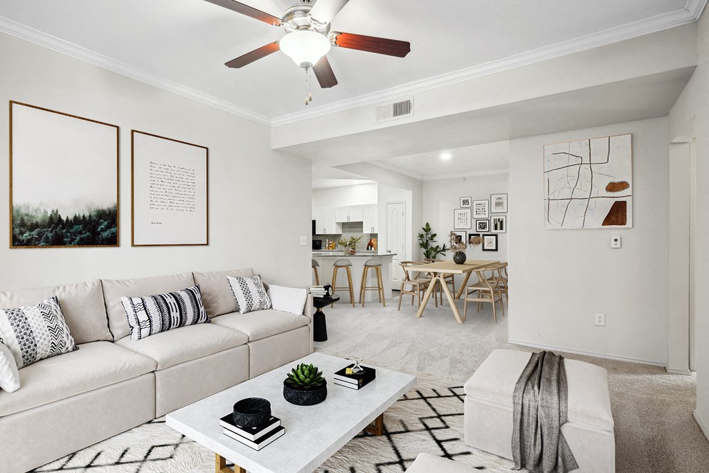 a living room with a couch and a coffee table at La Ventura Apartments, Plano, 75093