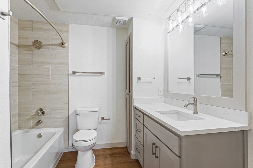 a bathroom with a sink toilet and a shower at The Legends at Eagle Mountain Lake, Fort Worth, TX