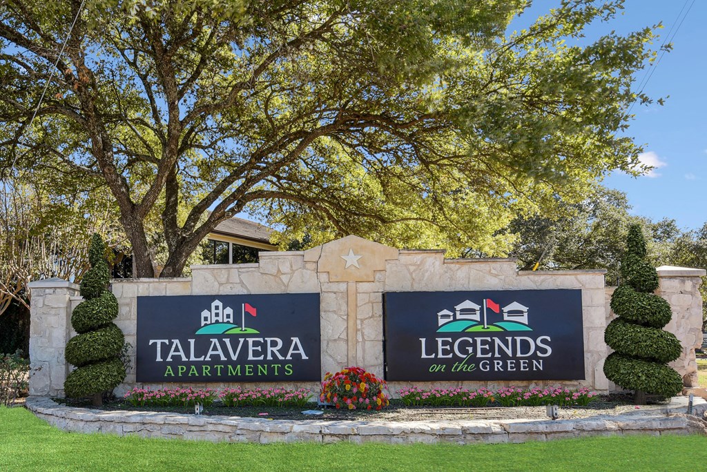 the sign at the entrance to thetalavera apartments on the green at TalaVera Apartments, San Antonio, TX, 78232