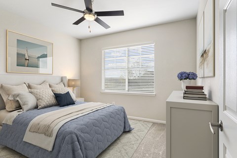 a bedroom with a bed and a ceiling fan at The Legends at Eagle Mountain Lake, Fort Worth, Texas