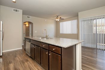 a kitchen with a sink and a counter top in a new home at The Cantera by Picerne, Las Vegas