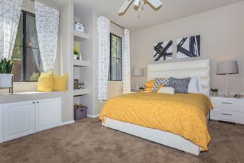 a bedroom with a yellow bed and a yellow blanket at The Preserve by Picerne, Nevada