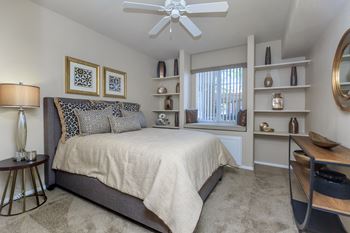 a bedroom with a bed and a ceiling fan at The Covington by Picerne, Nevada, 89139