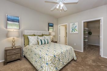 a bedroom with a bed and a ceiling fan at The Covington by Picerne, Nevada, 89139
