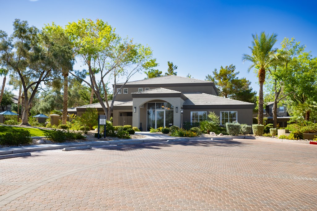 The Summit by Picerne's front office surrounded by trees.