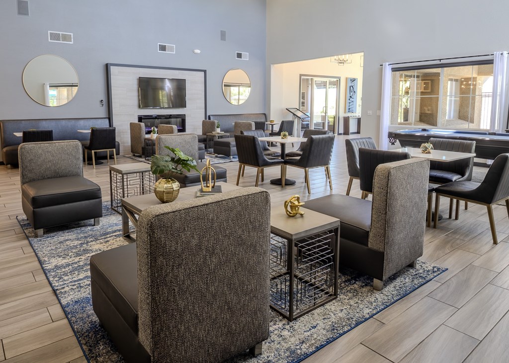 Clubhouse with plenty of seating, pool table, and fireplace.