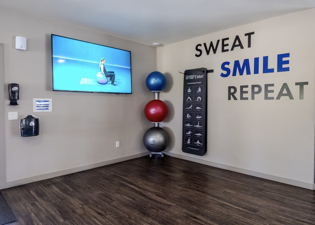 Fitness on Demand area with mats and fitness balls.