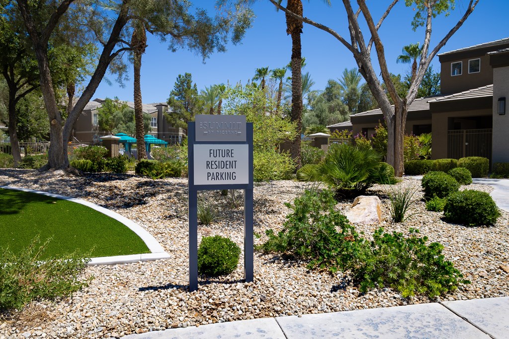 A sign in front of a building that says